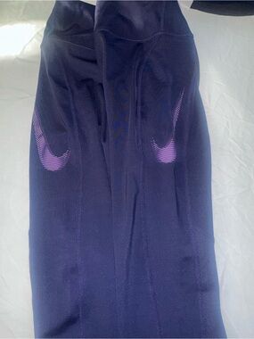 Nike Purple Leggings with Light Purple Swoosh Accents